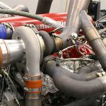 When the intake air leaves the turbocharger, the act of compressing it has heated it – to upwards of 400 degrees F. It’s the intercooler’s job to bring those intake air temps back down to around 110 or 120 degrees F.