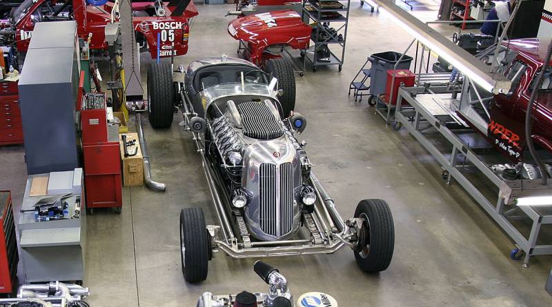 LenoTankEng_0710-123 Jay Leno's Tank Car is just one of several high profile development programs ongoing in the Banks Advanced Prototype Engineering labs. One of the Banks Sidewinder Duramax Diesel race trucks can be seen in the background. At this point in the Tank Car's transformation, all of the fabricated intake components and the fuel rails were sent out to be polished.