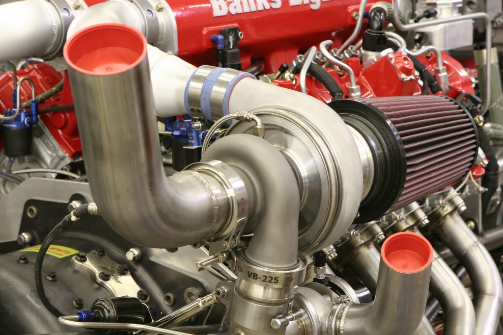 Twin Garrett turbochargers similar to those used on Le Mans racers force air into a custom Banks Big Hoss intake manifold