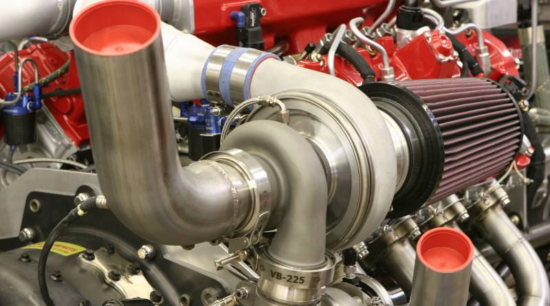 Twin Garrett turbochargers similar to those used on Le Mans racers force air into a custom Banks Big Hoss intake manifold