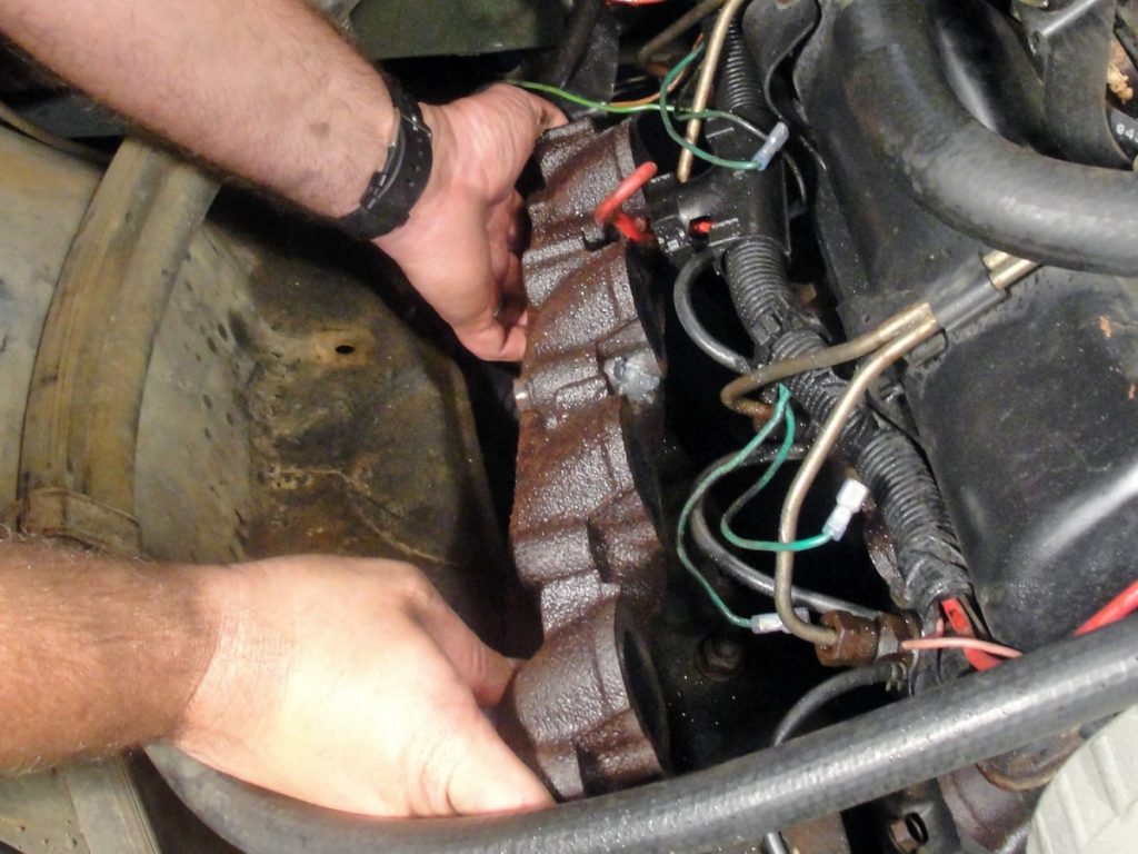 After removing the factory manifold, a bolt was welded to what was left of the stud and the bolt was removed.