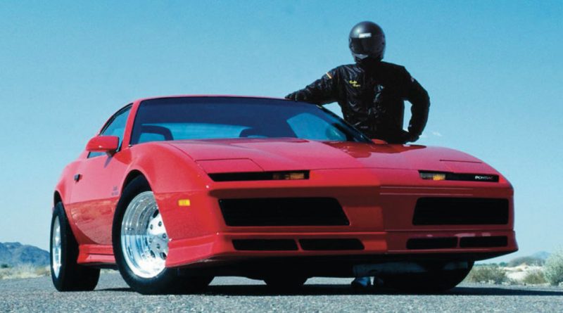 TM_Blog-Feature Gale standing next to a Firebird that helped build the tuner car craze.