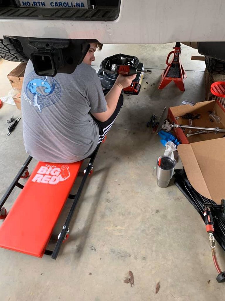 Brian Bland 2018 GMC Denali L5P Duramax - Son working on the truck
