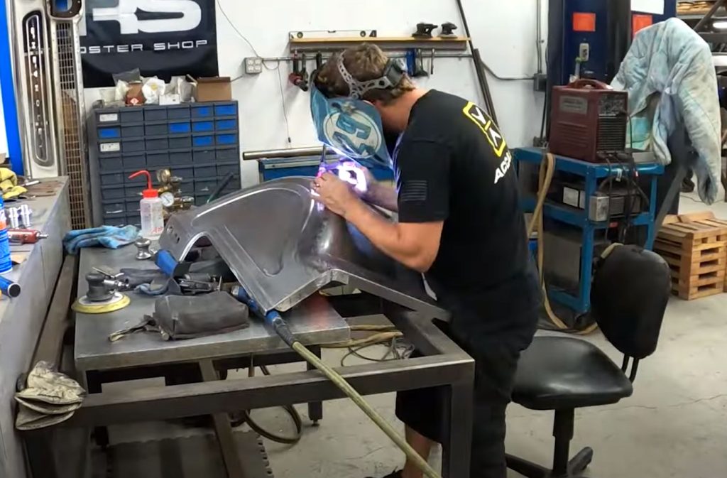 Sean at Empire Fab works on the wheel tubs before the big engine bay reveal.