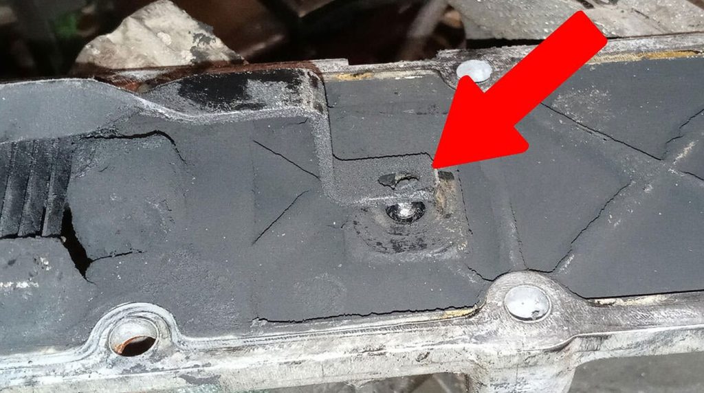 The problematic bolt isn't where it's supposed to be because it's fallen out.