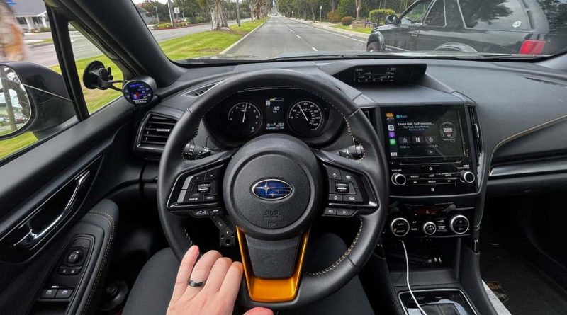 The cockpit of the Subaru displaying the Banks iDash.