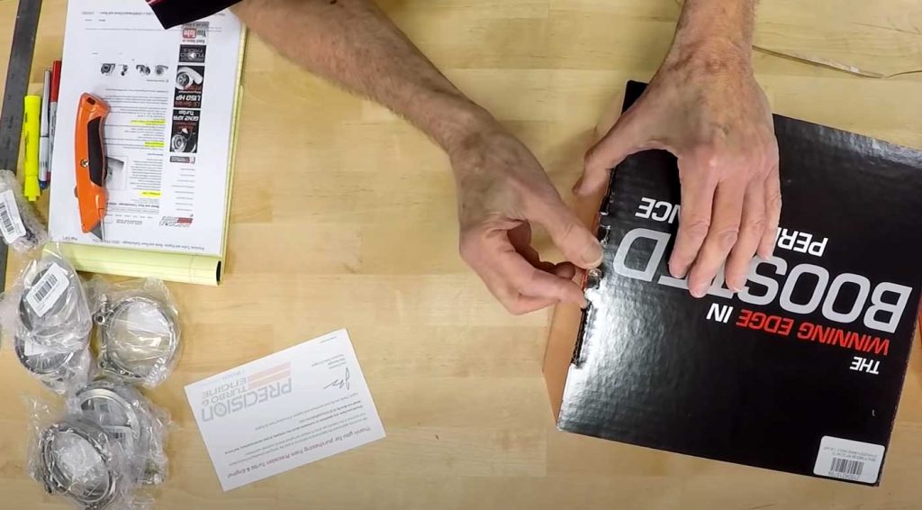 Gale unboxes a pair of PT6870 Gen 2 turbochargers from Precision Turbo & Engine Turbochargers