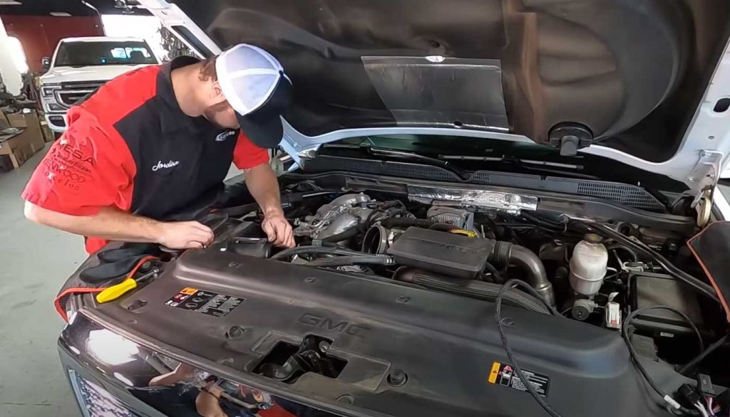 The team at Cartronics installing all the Banks parts in the Duramax owned by Guy Fieri