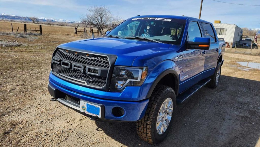 The exterior of the blue 2014 Ford F-150 FX4