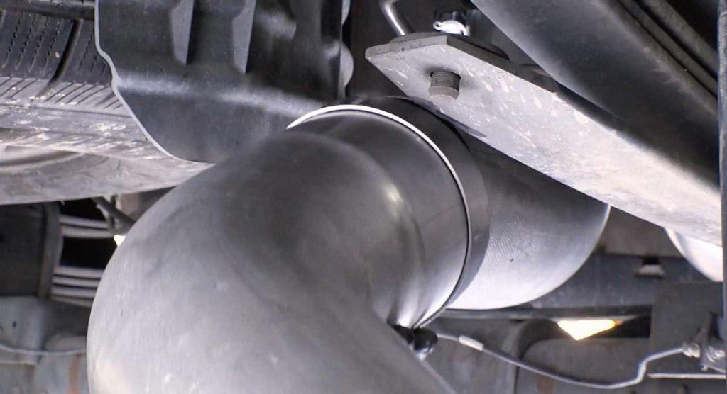 Slide the rear tailpipe onto the mid-tailpipe section.