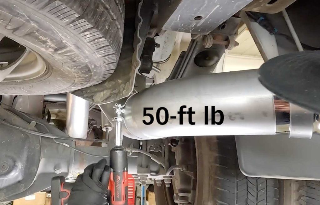 When you have the tip lined up correctly, torque all the clamps to 50-ft lb.