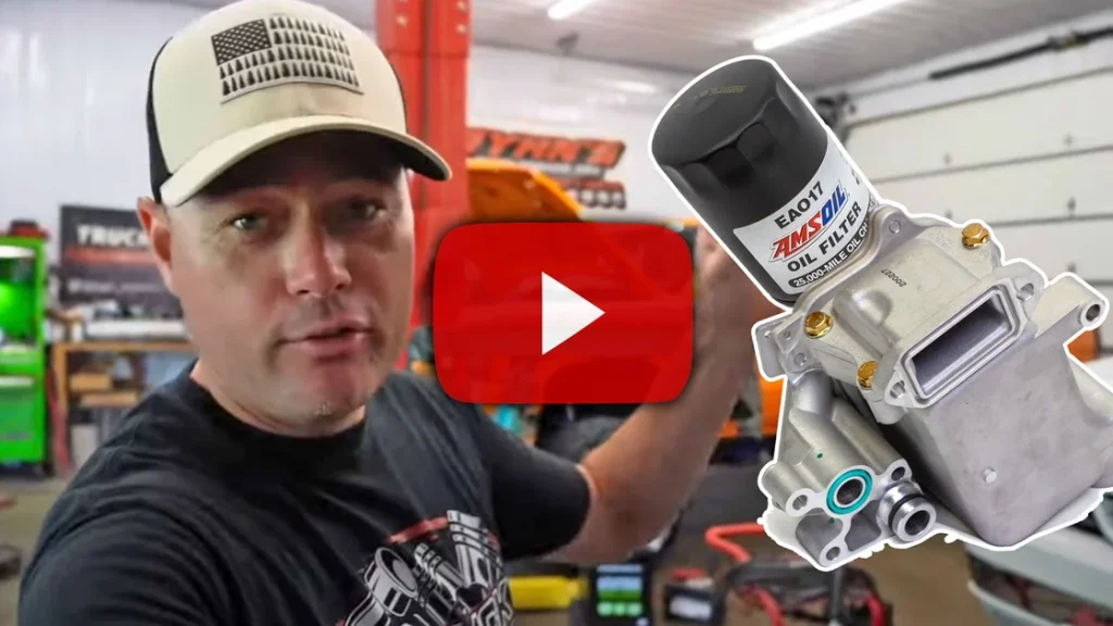 Josh from Truck Master Garage replacing oil cooler