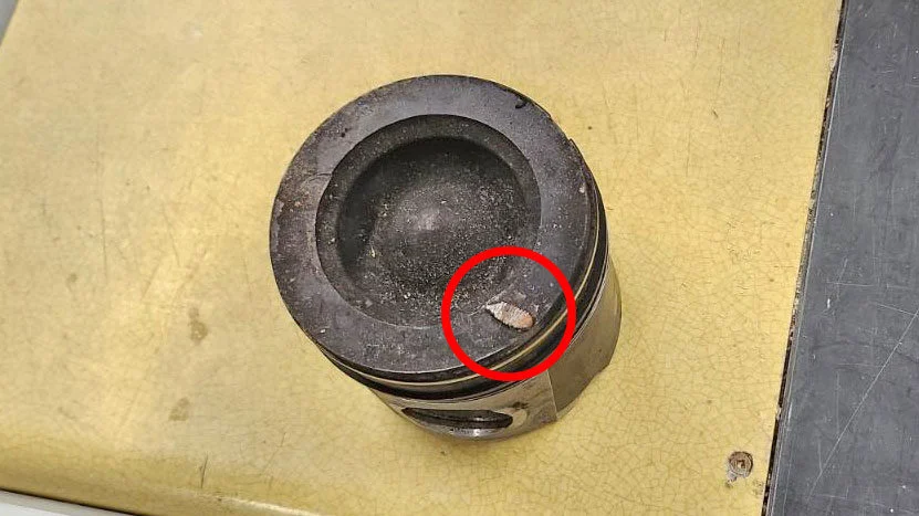 RAM engine piston embedded with grid heater bolt