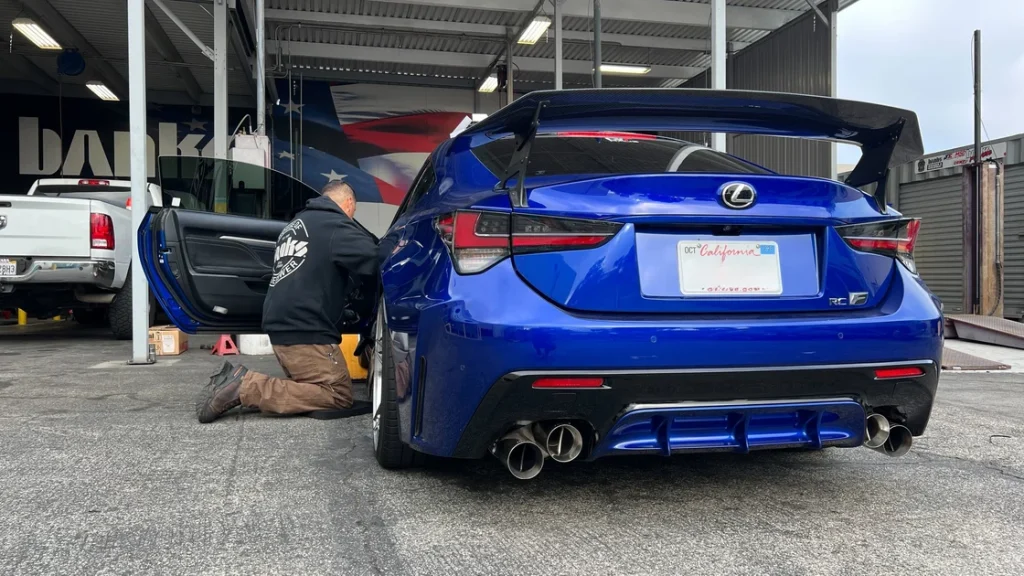 Lexus 5.0L engine bay with Banks Power iDash and PedalMonster installed