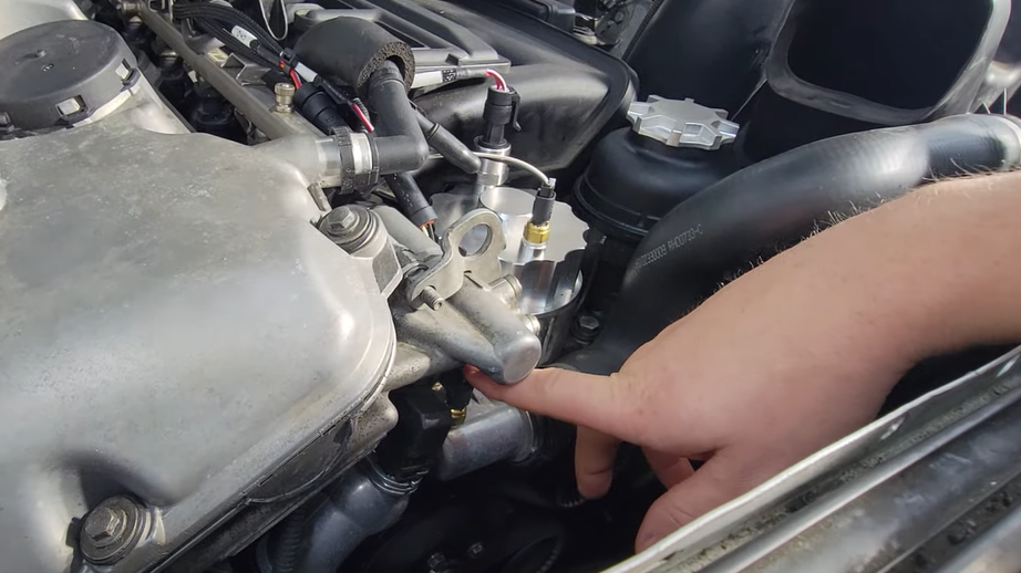 Tyler Ovens installs iDash SuperGauge and sensors in a 2003 BMW X5 for real-time engine data monitoring.