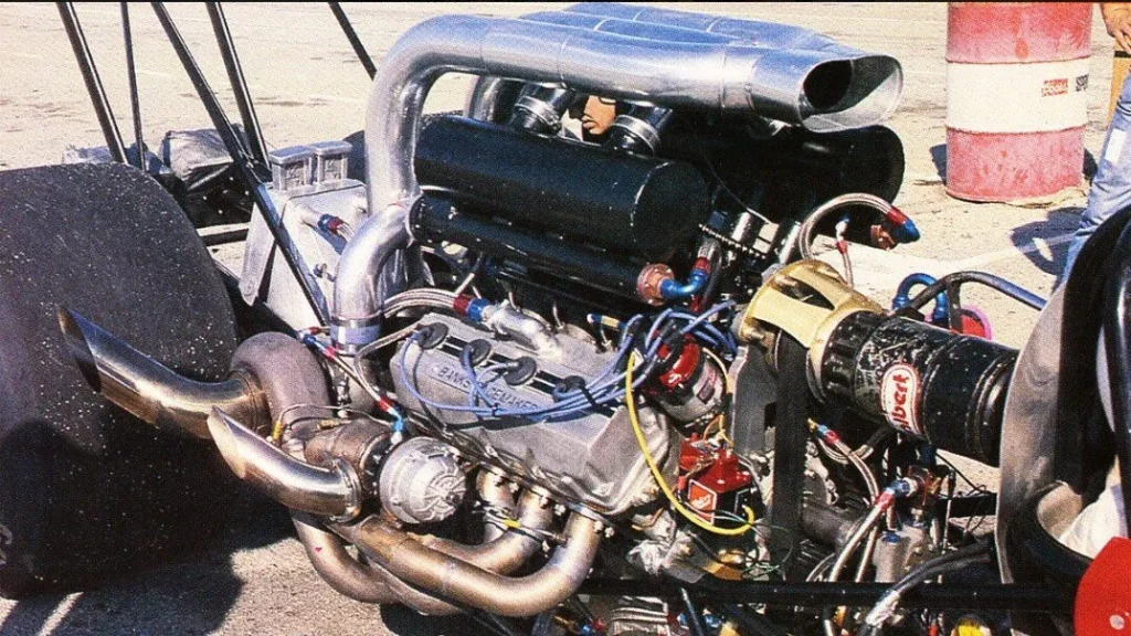 Vintage racing scene with banned Banks-powered car