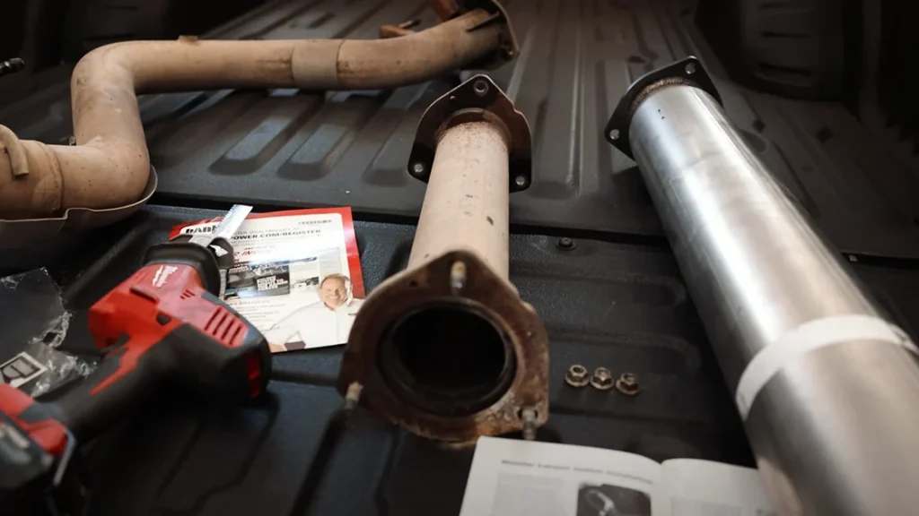 Close-up of stock and Banks Power performance parts on F-250​