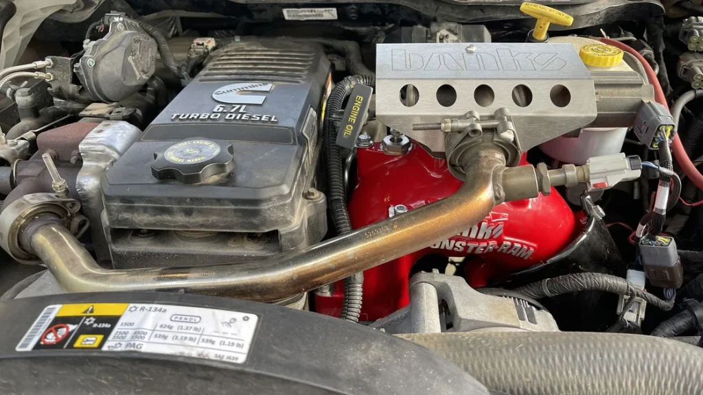 A Ram truck engine bay showing the installed Banks Monster-Ram.