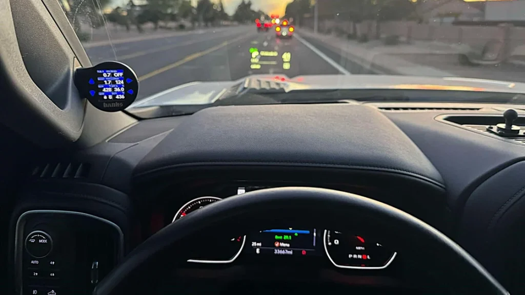 The Banks iDash SuperGauge installed in the dashboard of a Chevy Silverado.
