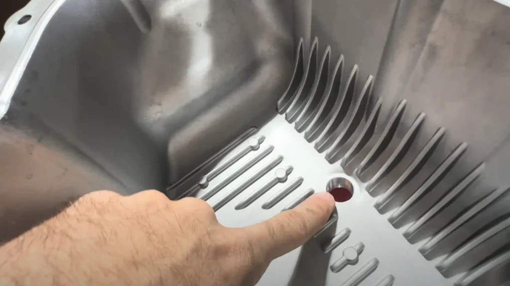 Banks CoolRunner oil pan installed on a GMC Denali 2500 HD.