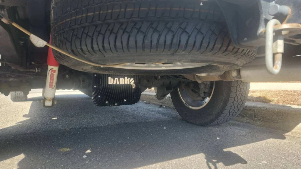 Banks Deep Aluminum Oil Pan installed on a 2021 GMC Sierra 2500HD Duramax to eliminate dirty leftover oil and improve engine longevity.