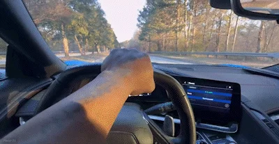 Don Russell driving his C8 Corvette with PedalMonster