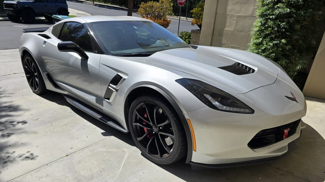 Corvette C7 interior showing Banks iDash Pro gauge with PedalMonster tuning
