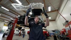 The Banks CoolRunner lower oil pan replaces the factory stamped-steel pan, providing complete drainage, +2 quarts capacity, and FlowThru cooling fins