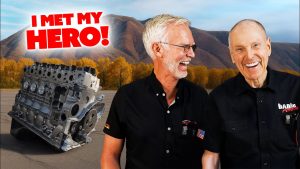 Dave Bell of Dave’s Auto Center and Gale Banks standing together next to a diesel engine block in Centerville Utah