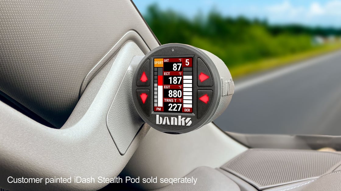 Banks iDash SuperGauge mounted in a color-matched A-pillar Stealth Pod monitoring Duramax engine parameters
