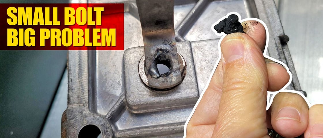 Failed factory 6.7L Cummins grid heater showing electrical arcing and loose bolt that causes cylinder 6 engine failure